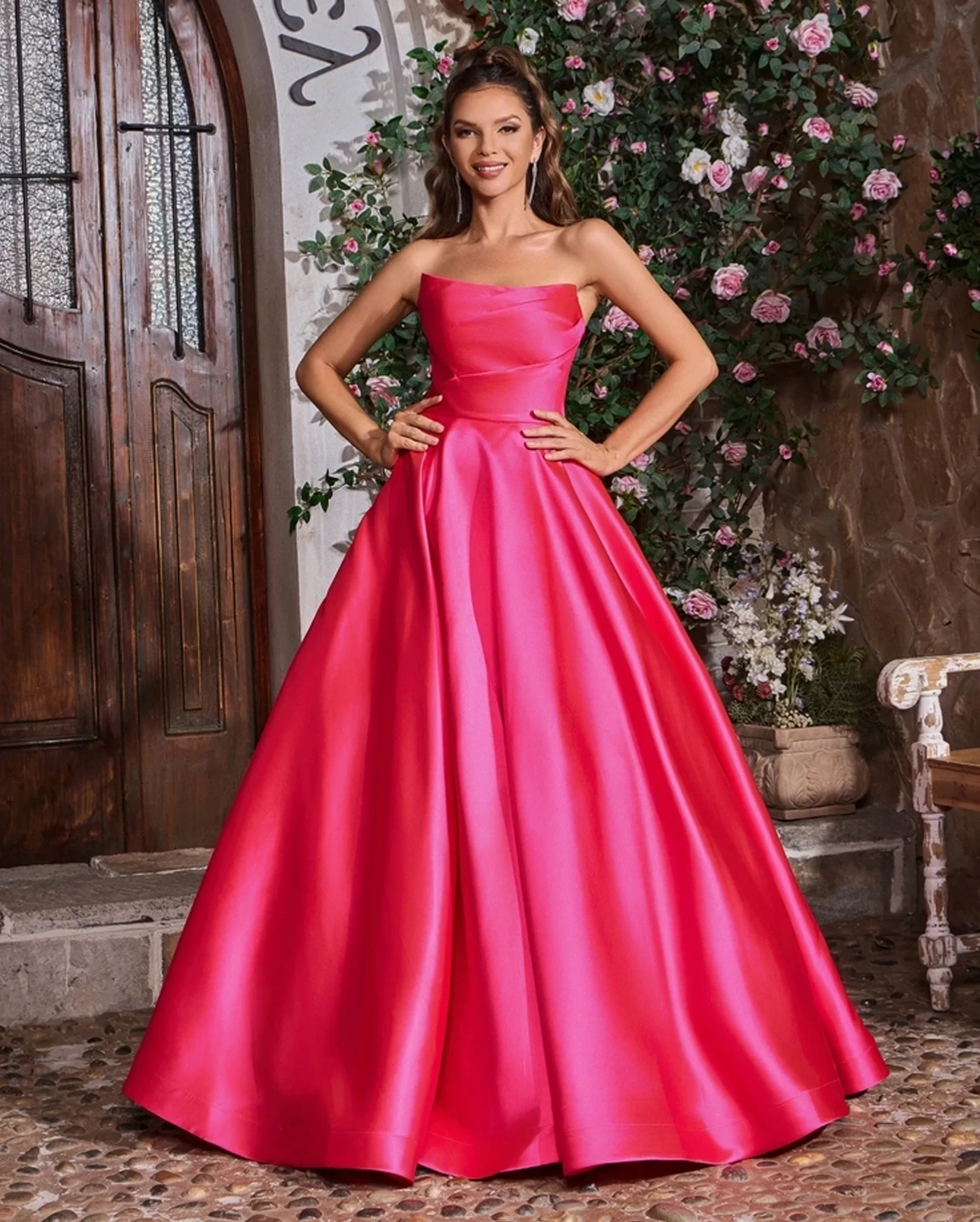 Model wearing a gown by Jadore