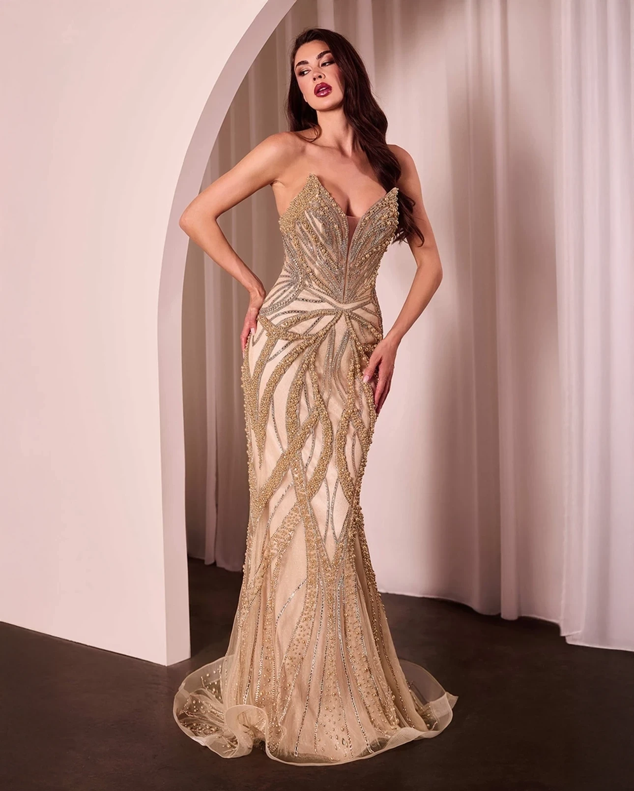 Model wearing a gown by Ladivine by Cinderella Divine