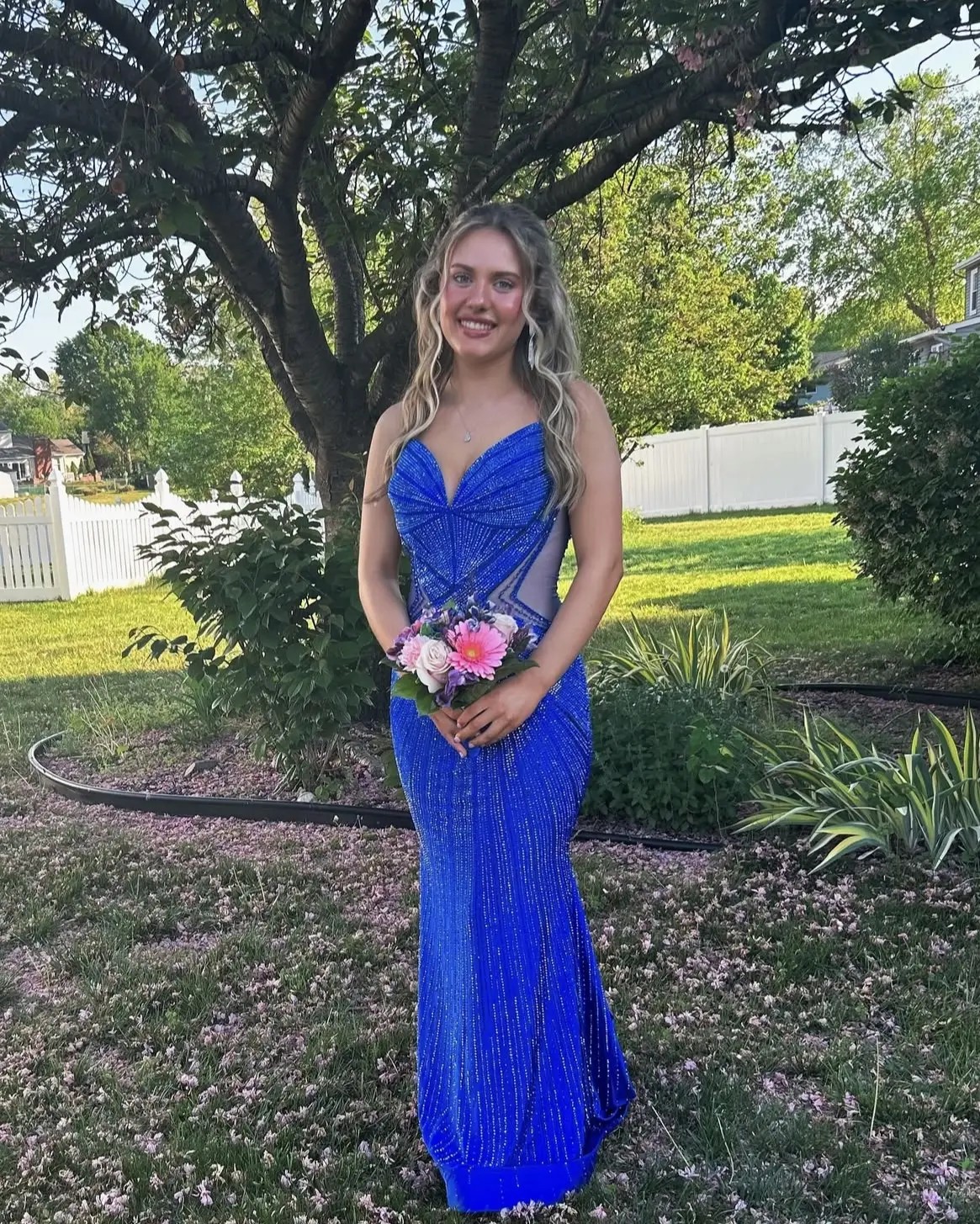 Brown-haired girl in blue dress
